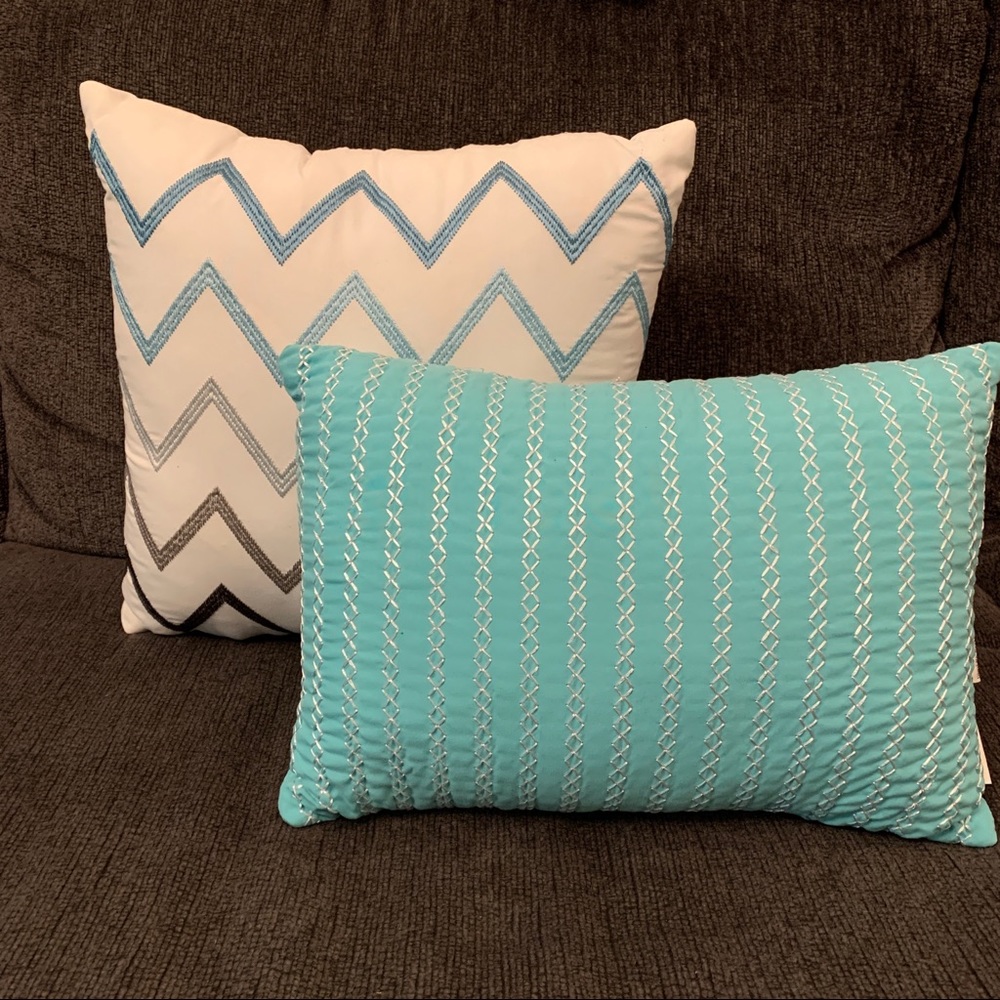 Thrown pillows are in like new condition